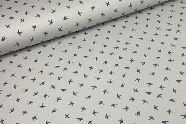 Baumwolljersey Jerseydruck Motive Vögel Schwalben auf Hellgrau